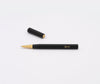 Ystudio قلم كرة دوارة من الراتنج باللون الأسود